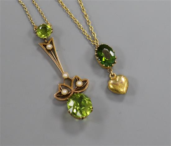 An early 20th century 9ct gold, peridot and seed pearl set drop pendant and a 9ct gold and doublet set heart drop pendant.